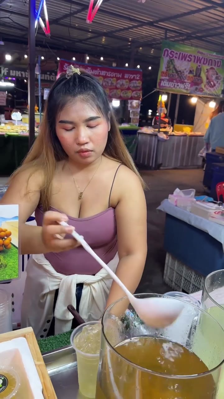 Watch Cute Thai Lady Sells Longan Juice